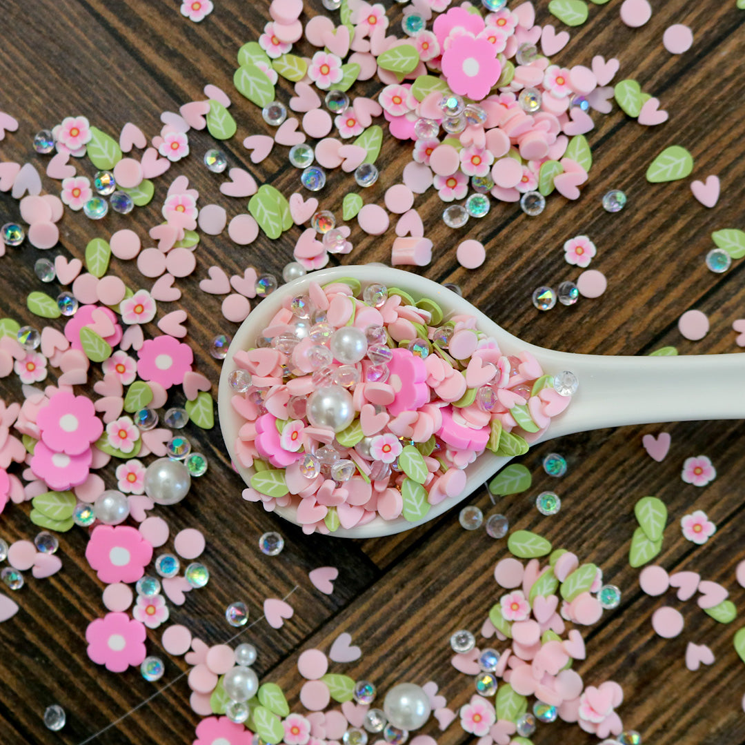 Hearts in Bloom confetti mix with pink flowers, hearts, pearls, and sequins by This Calls for Confetti.